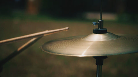 drummer hitting cymbals