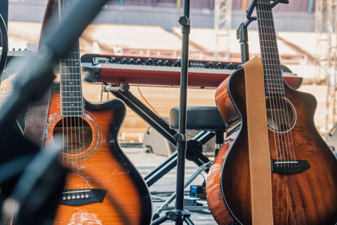 duo guitars on stands