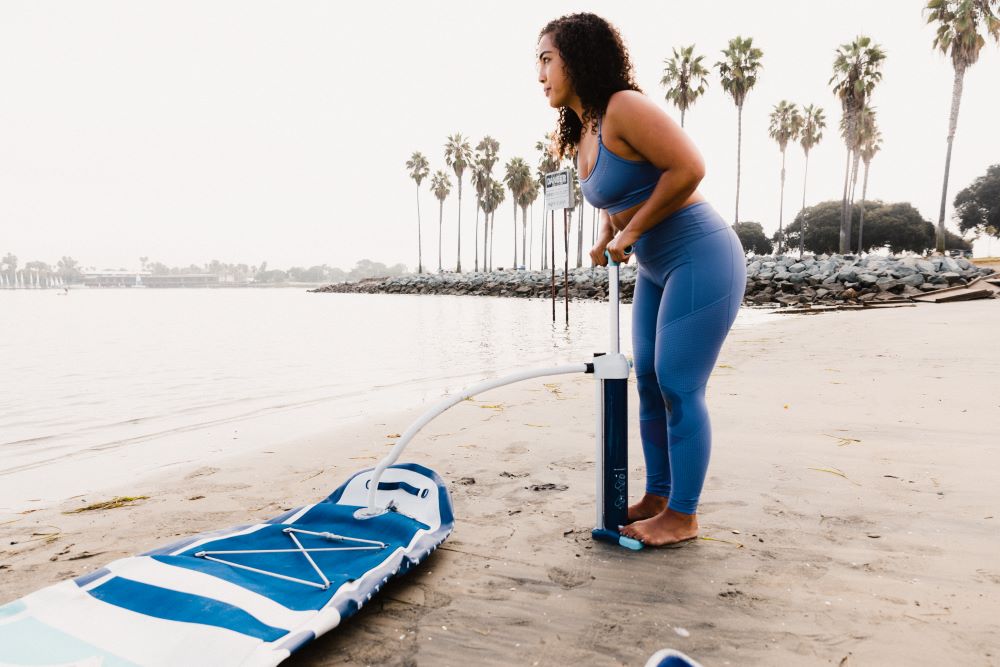 woman pumping SUP