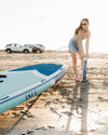 Women Inflating The Megalodon Paddle Board