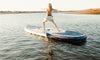 Women Doing Yoga On The Megalodon Paddle Board