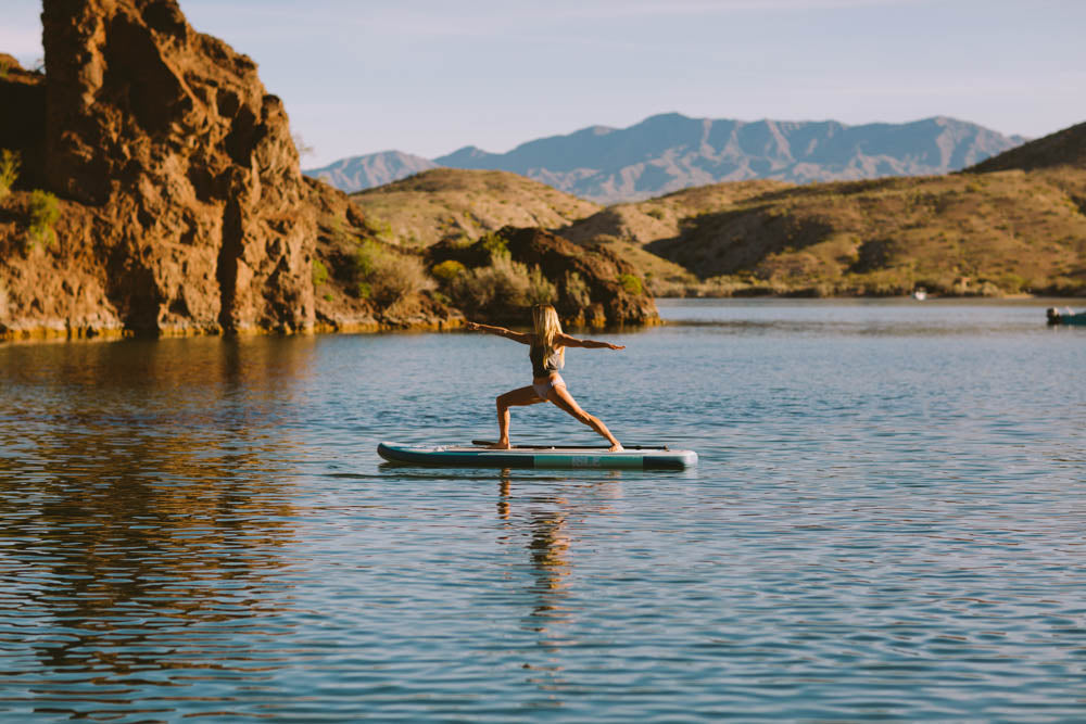 woman doing yoga on SUP