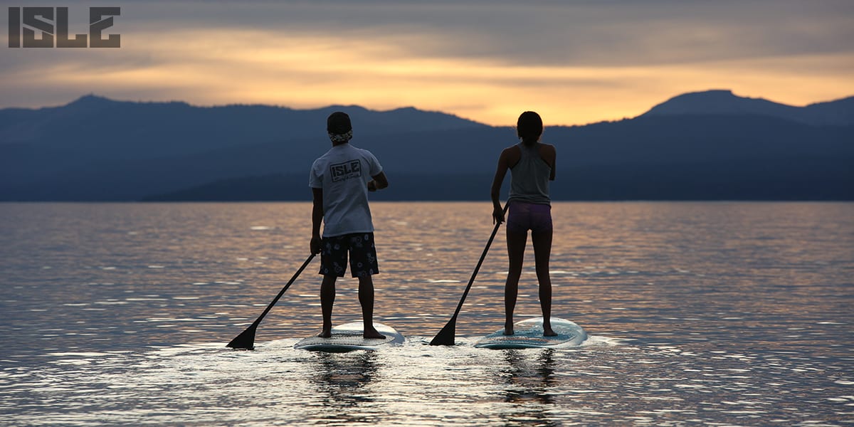 sunset paddle boarding