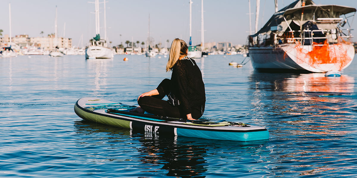 5 Ways Paddle Boarding Will Get You Out of Your Bubble