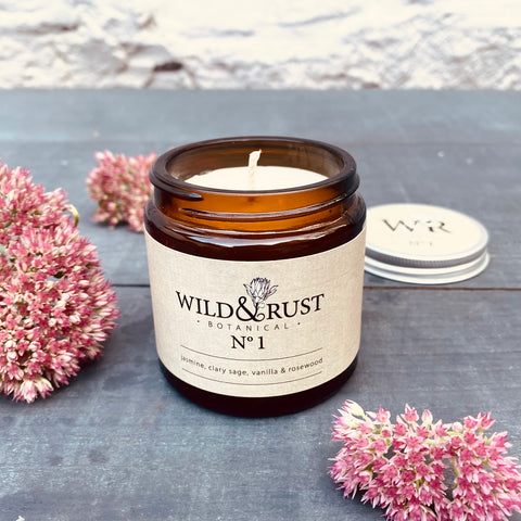 Wild & Rust Botanical No. 1 Candle in a small amber glass jar