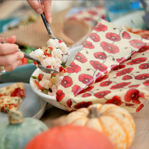 Eco-friendly beeswax wraps over food bowl at garden party in Henley