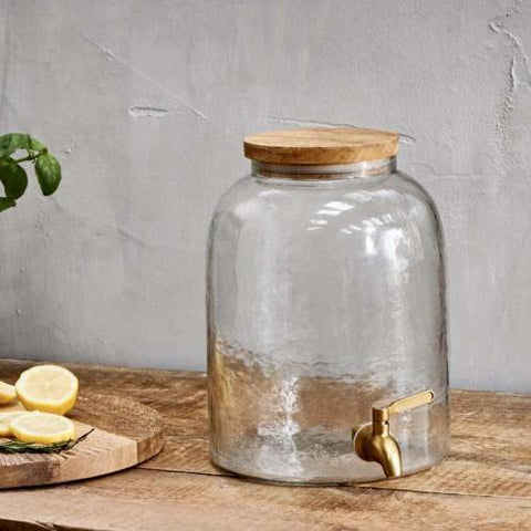 Recycled glass water dispenser on wooden table at Henley gift shop