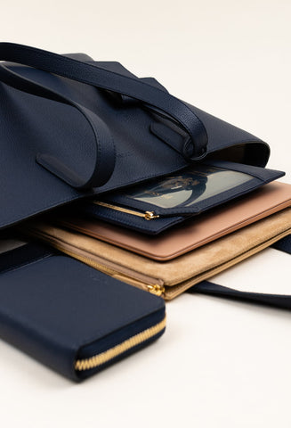 Navy Everyday Tote with Seeview Folio in suede and leather zip wallet all by STOW.