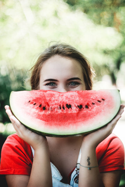 woman eating watermelon