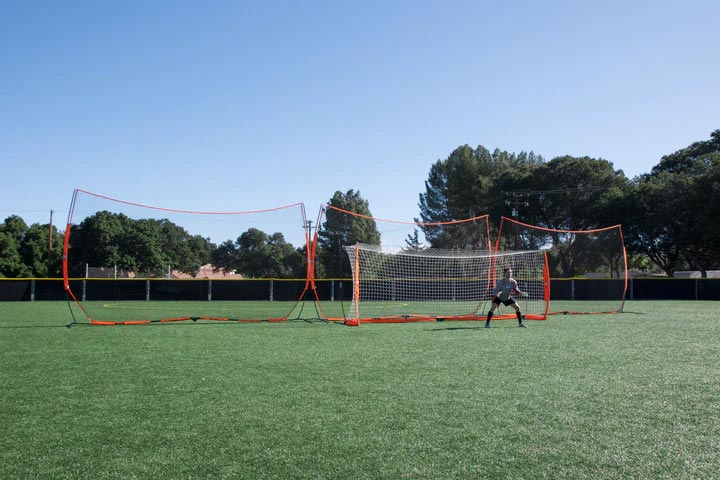 Three large bownet barrier nets in a line, with bownet soccer goal in front