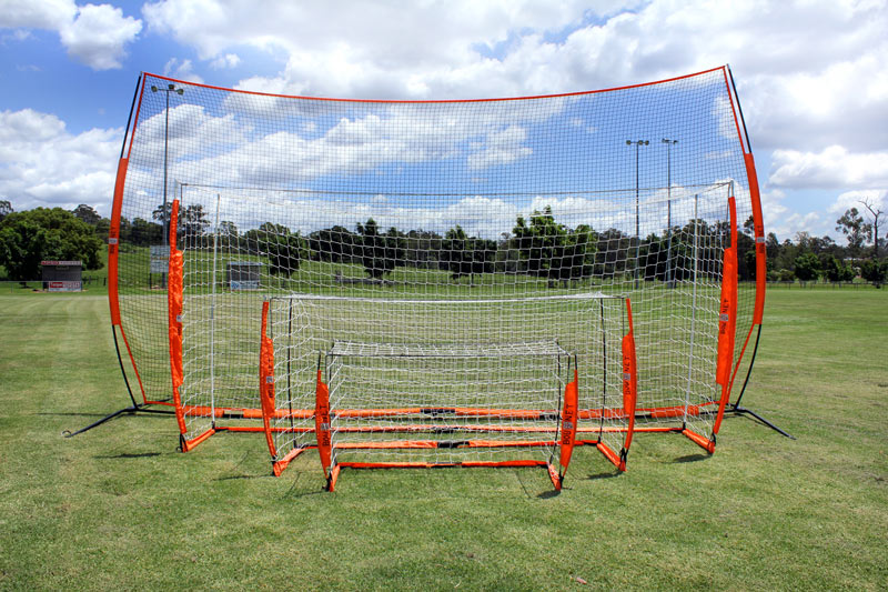 Group of bownet goals on grassy field. Need to know what a full size goal is? What is the right size goal for kids or adults? What goal to use for under 10s under 9s and under 7s? We have all the goal and age info here.