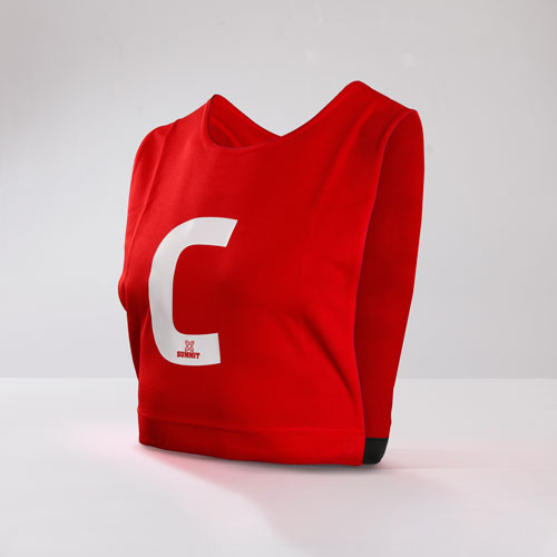 Red netbal bib with centre print front and back. The red netball bib has open sides and elastic for easy fit across senior and junior netball.