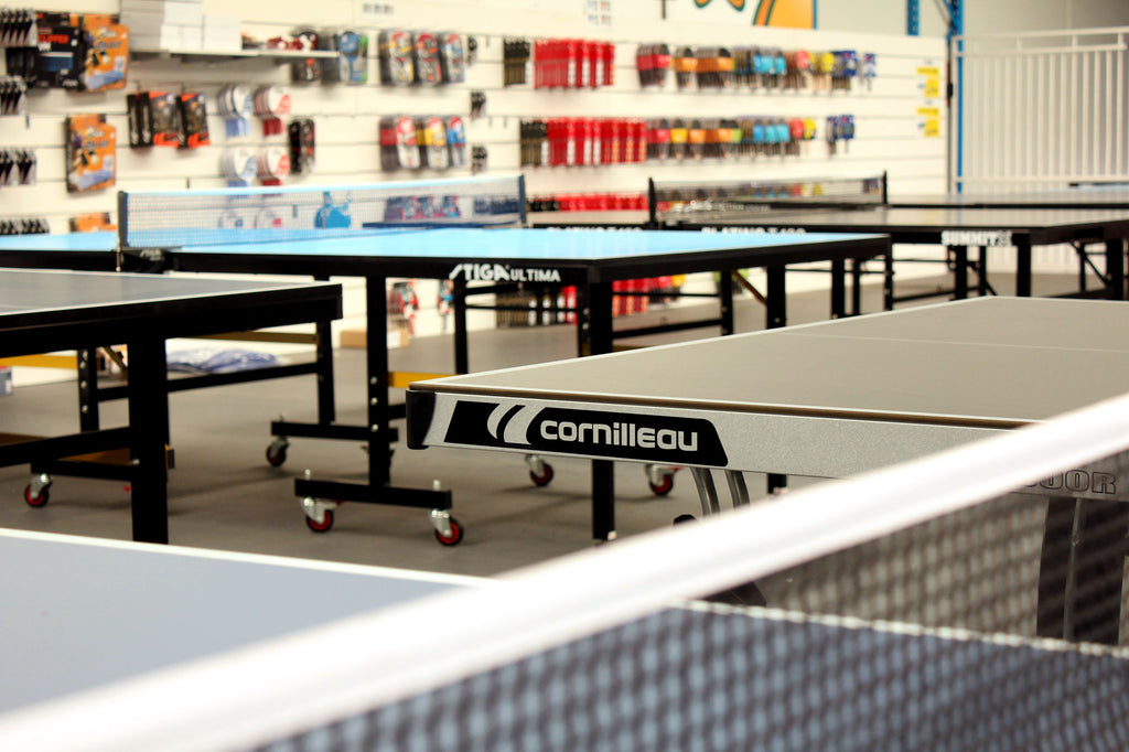 Cornilleau table tennis tables in shop. Find the perfect ping pong table for you, your family, club or school. Professional and fun tables for outdoor use. Is there a chance your table will get wet? If so, then the Cornilleau ping pong tables are the ones for you.