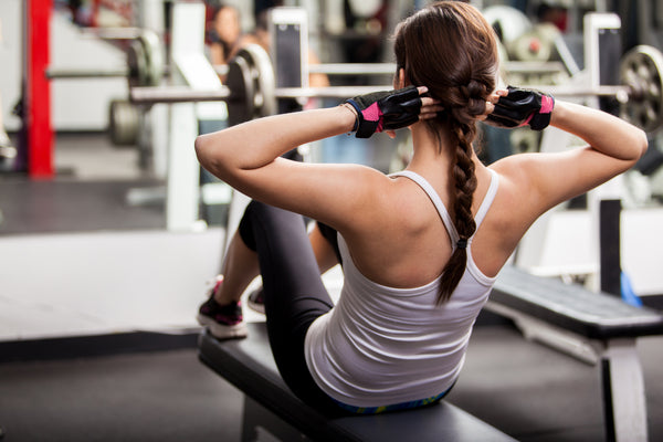 woman working out sit ups