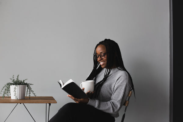 woman studying the Bible and mediating 