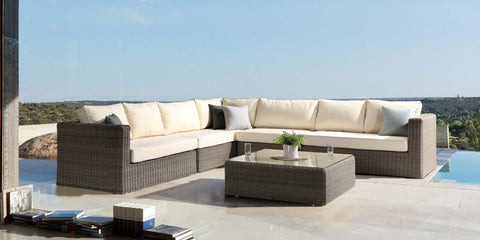 natural rattan furniture on sunny terrace