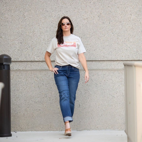 Woman walking in sustainable denim jeans