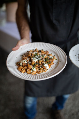 serving a plate of fresh pasta. gluten free pasta near mea