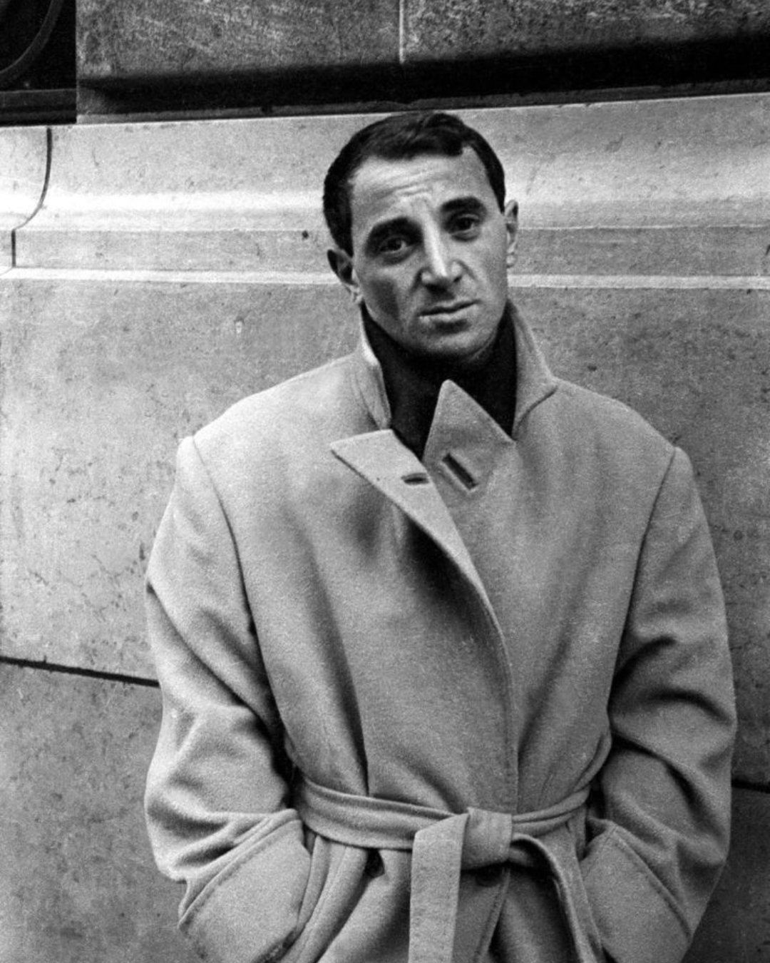 Charles Aznavour in a coat