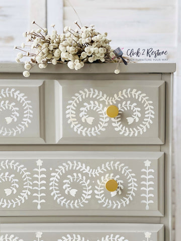 Beige dresser decorated with white paint Elegant Vine Stencil effect