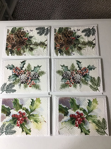 Christmas greenery in handmade greeting cards made with decoupage napkins.