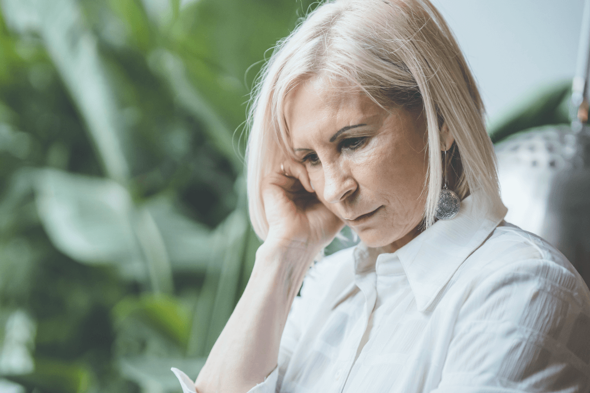 Thoughtful looking older woman