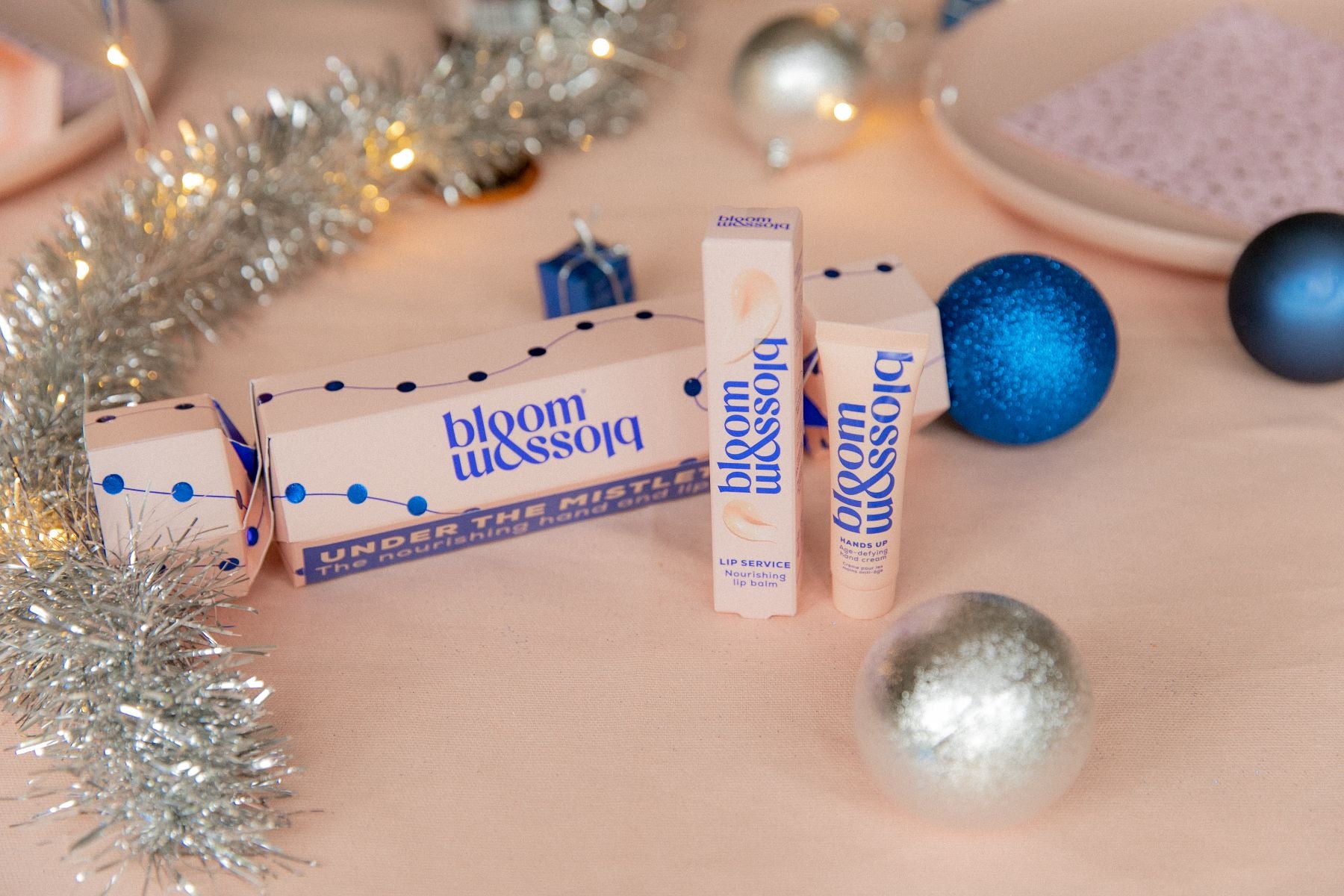 Under The Mistletoe beauty Christmas cracker with beauty products.