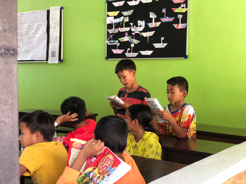 Students Reading English Book