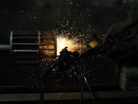 Rotor being sprayed with a wear resistant coating via flame spray technology
