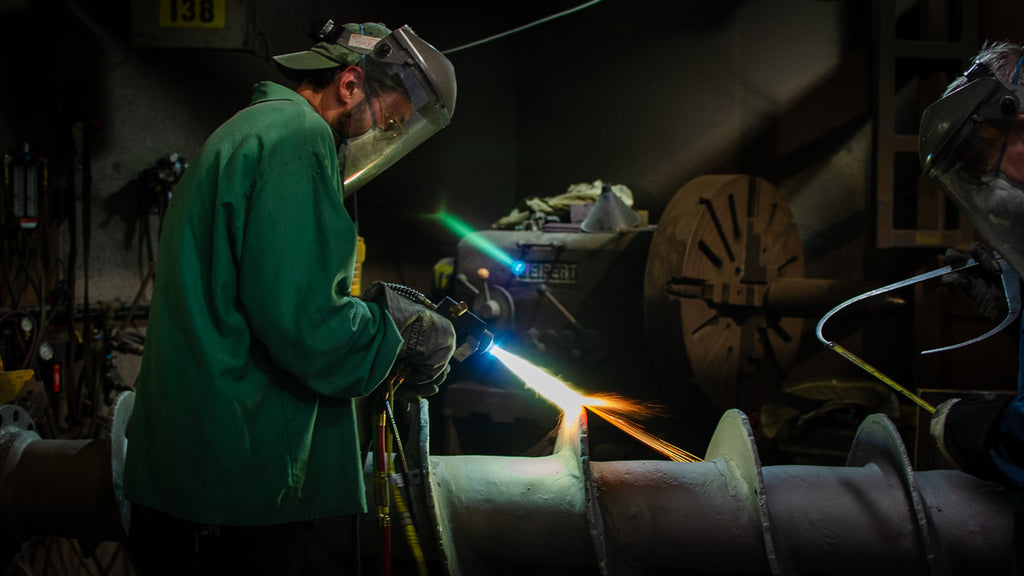 Thermal Spray Technician fusing a spray and fuse coating