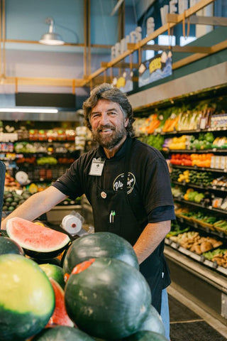 Man working at Vintage Grocers