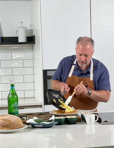 Chef William Dissen cooking scrambled eggs