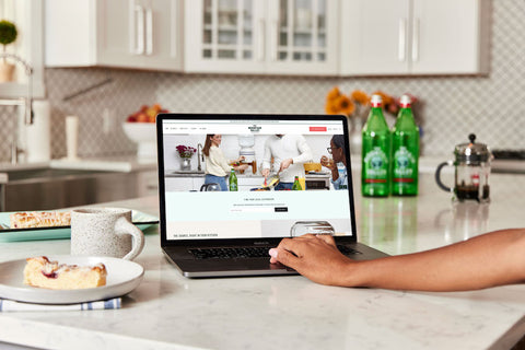 Woman ordering Mountain Valley Spring Water home delivery online