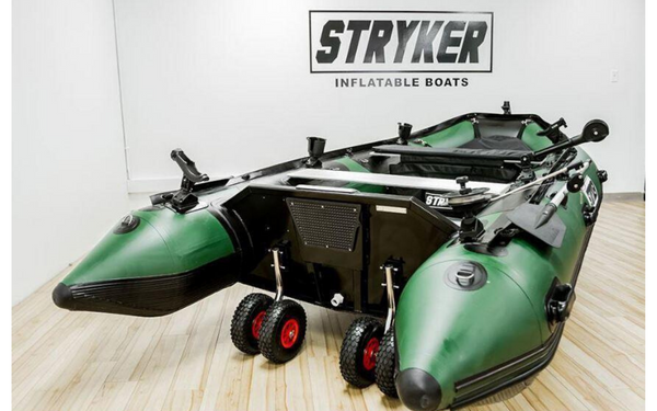 A green Stryker Pro inflatable boat. 