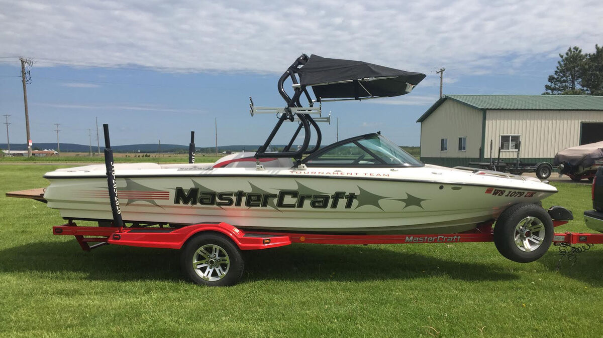 Roswell Marine Area 53 Wake Tower with Bimini Top installed on a boat