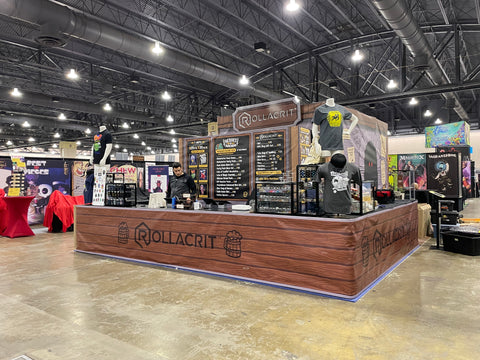 Rollacrit's booth at PAX Unplugged 2022 | Rollacrit