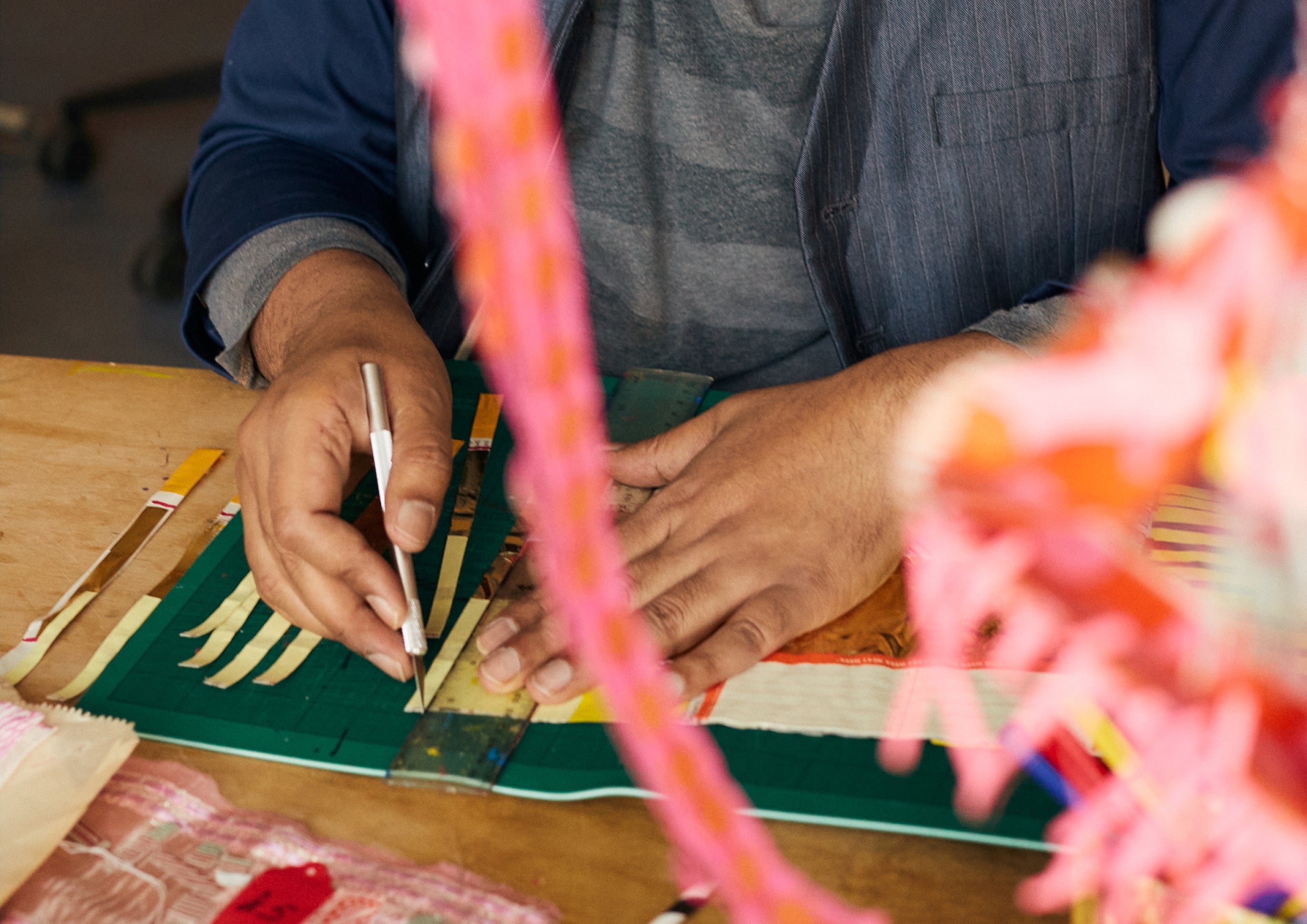 Hands creating artwork