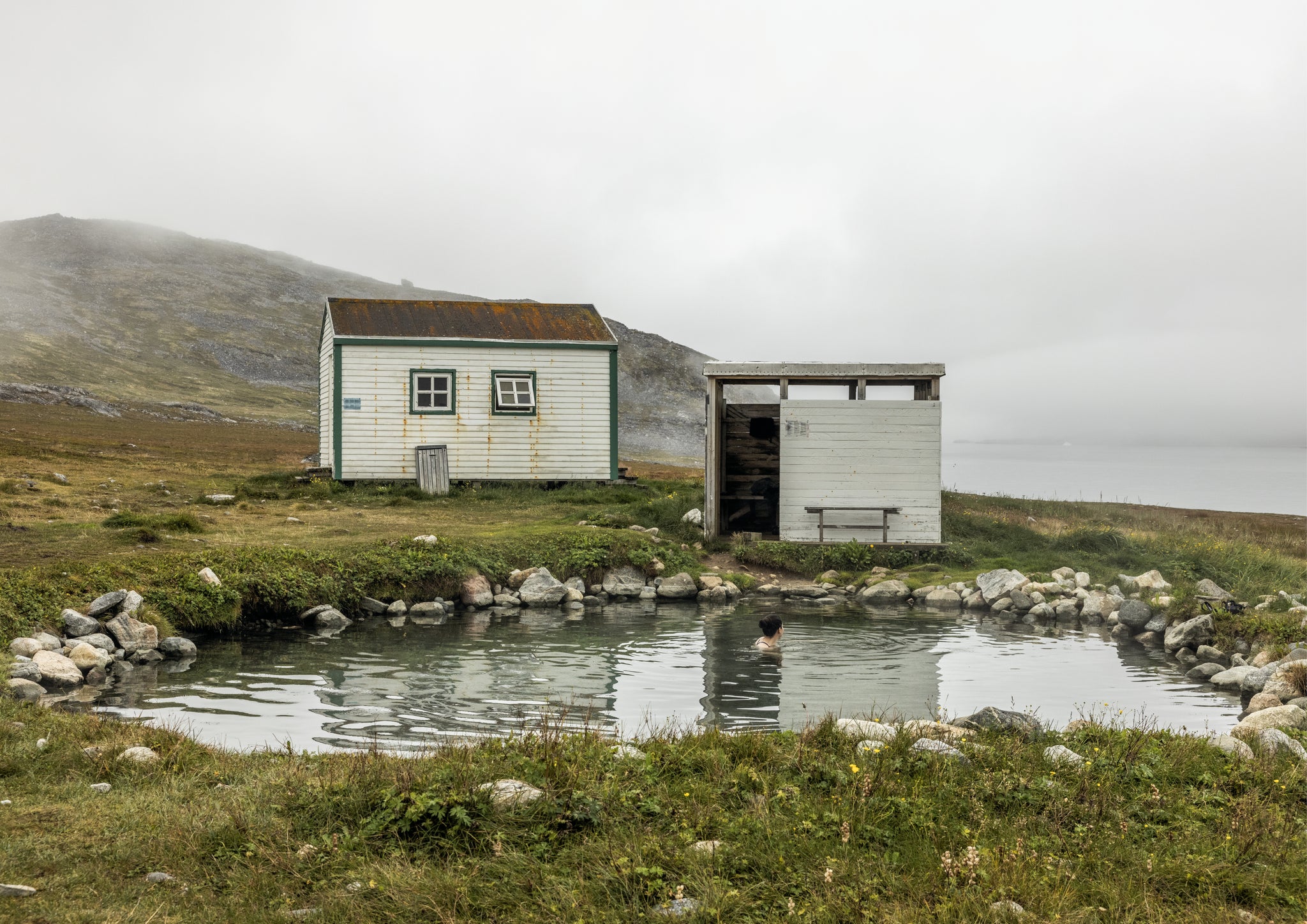 Cabin by a pond