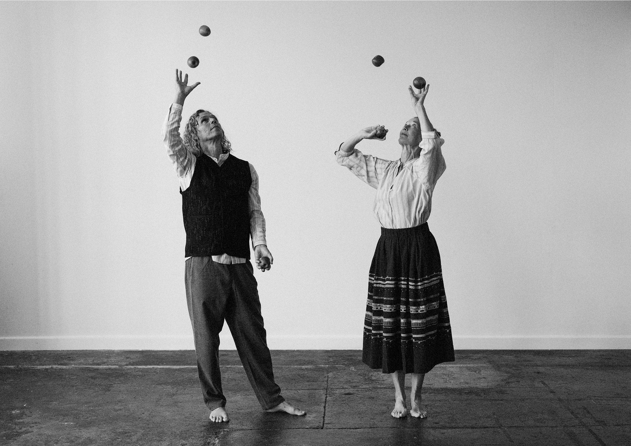 Man and woman juggling