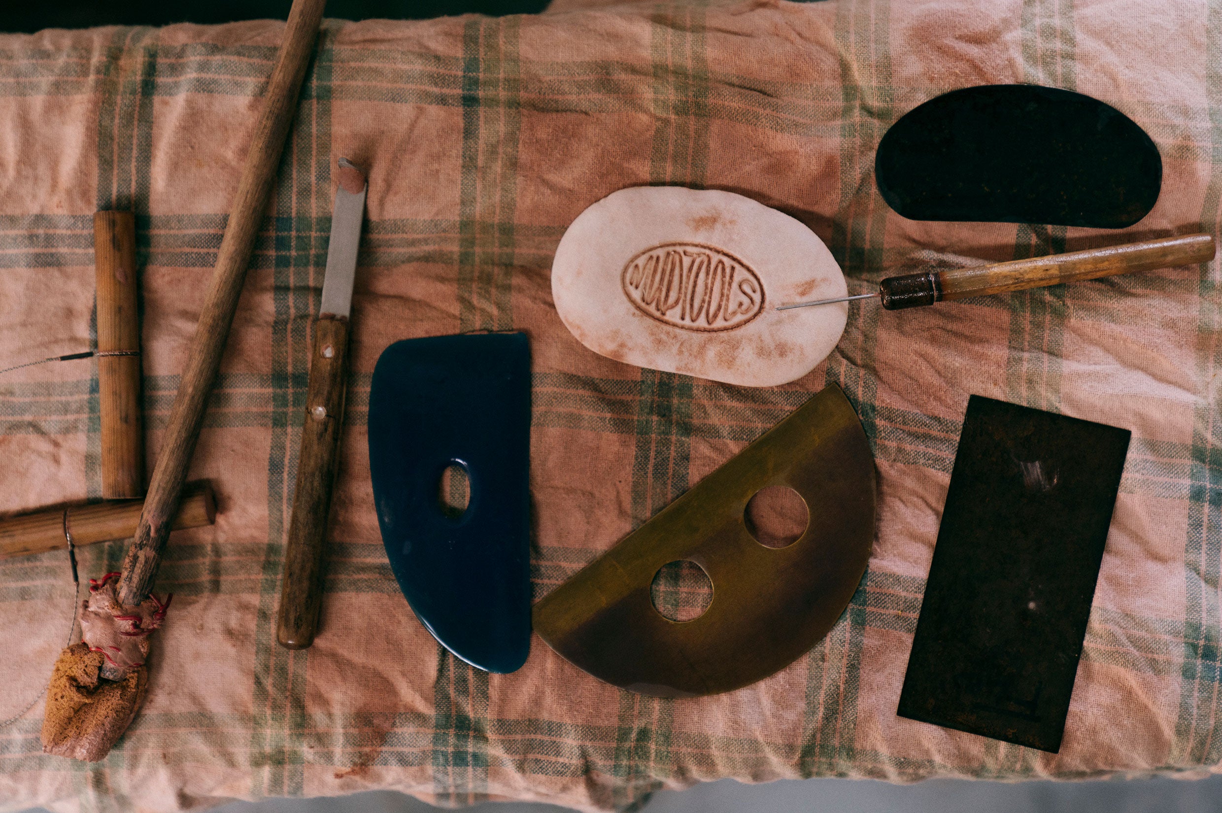 Pottery tools on a tea towel