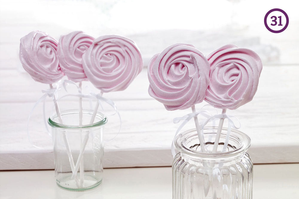 pink meringue lollipops in glass jars against a white backdrop. The image is labeled "31" in the upper right corner. 