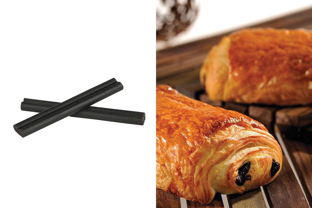 Two images: the left image is of two criss-crossed chocolate batons. The right image is of two pain au chocolat on a picnic table. 
