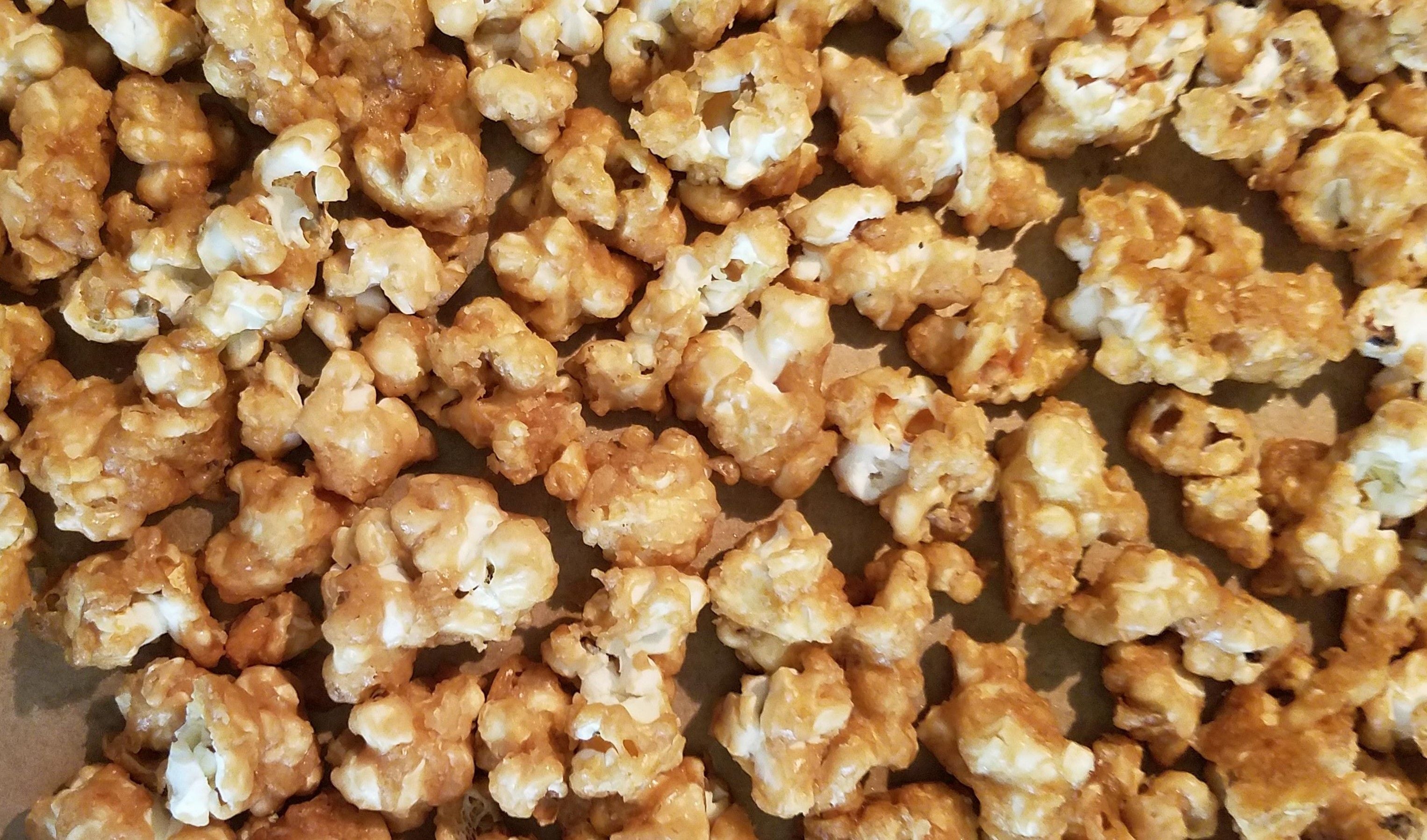 a close up image of pumpkin spice Caramel Corn