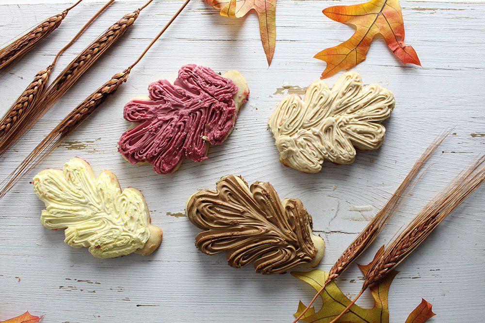 Sugar Cookies frosted like fall leaves with flavored buttercream