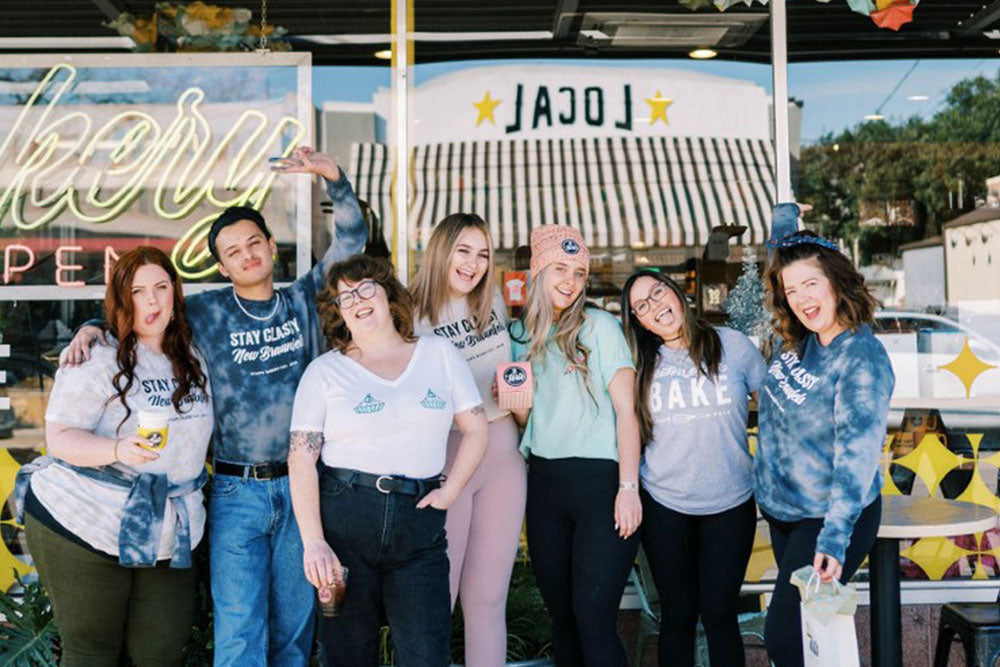 Photo of the 2tarts team standing outside of the 2tarts Bakery in New Braunfels, Texas.