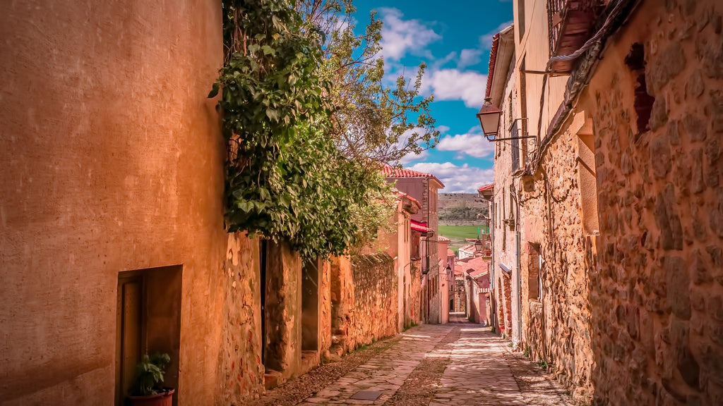 Medieval cobbled street in a village in Spain