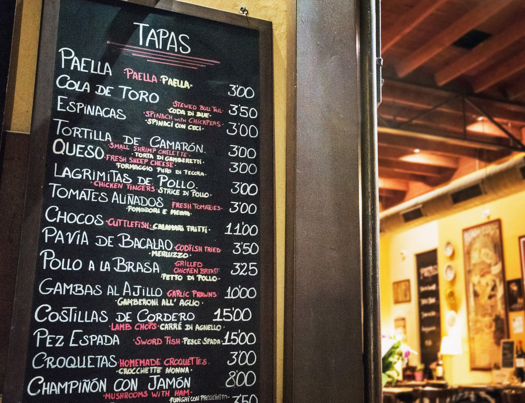 Tapas menu outside a restaurant in Spain