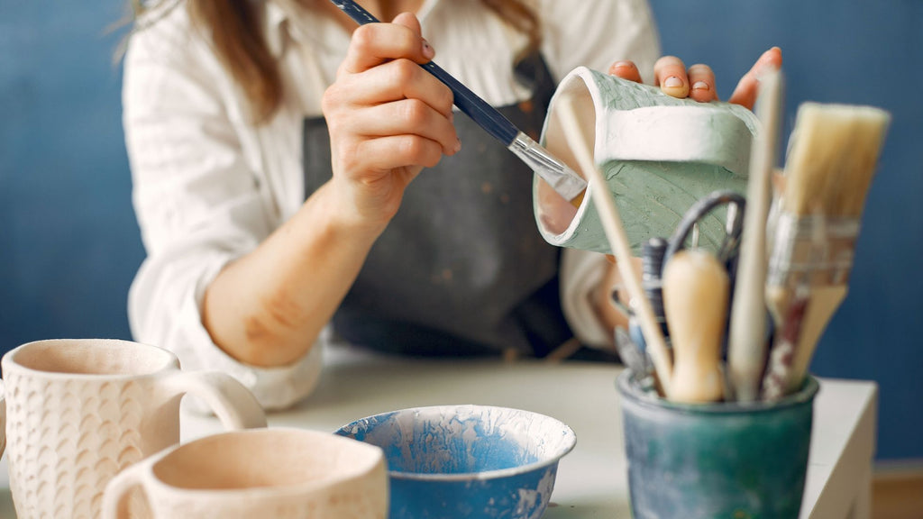 artisan paining pottery