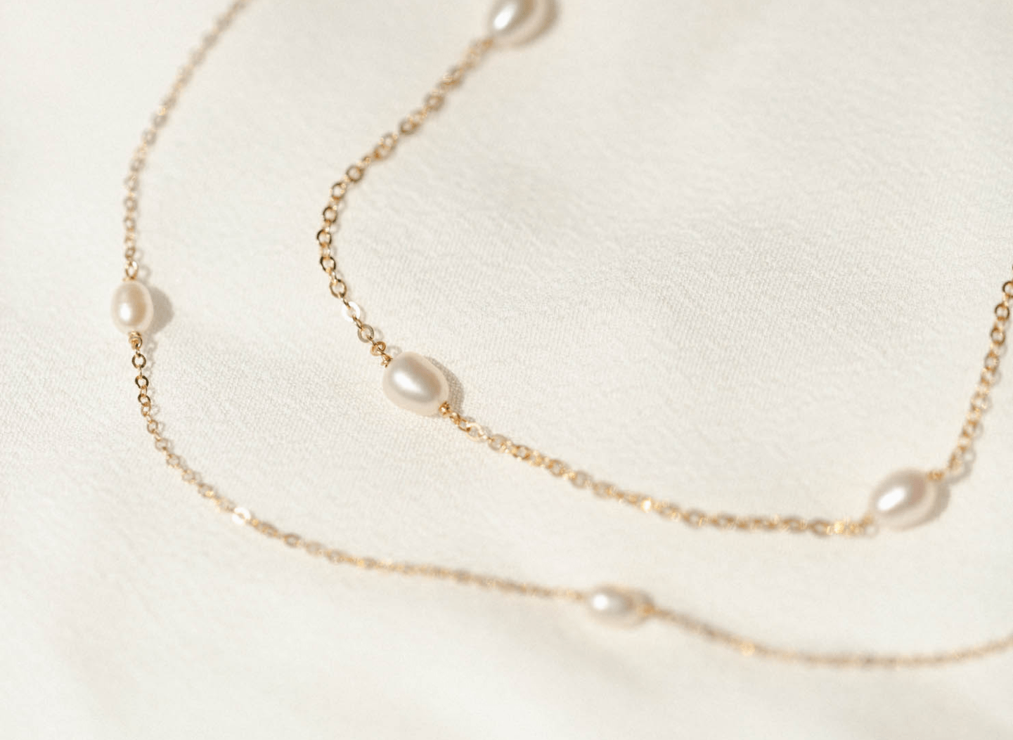 10k Solid Gold Floating Pearl Chains