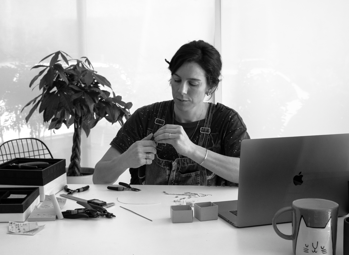 Chrissy, GLDN founder, working on jewelry designs